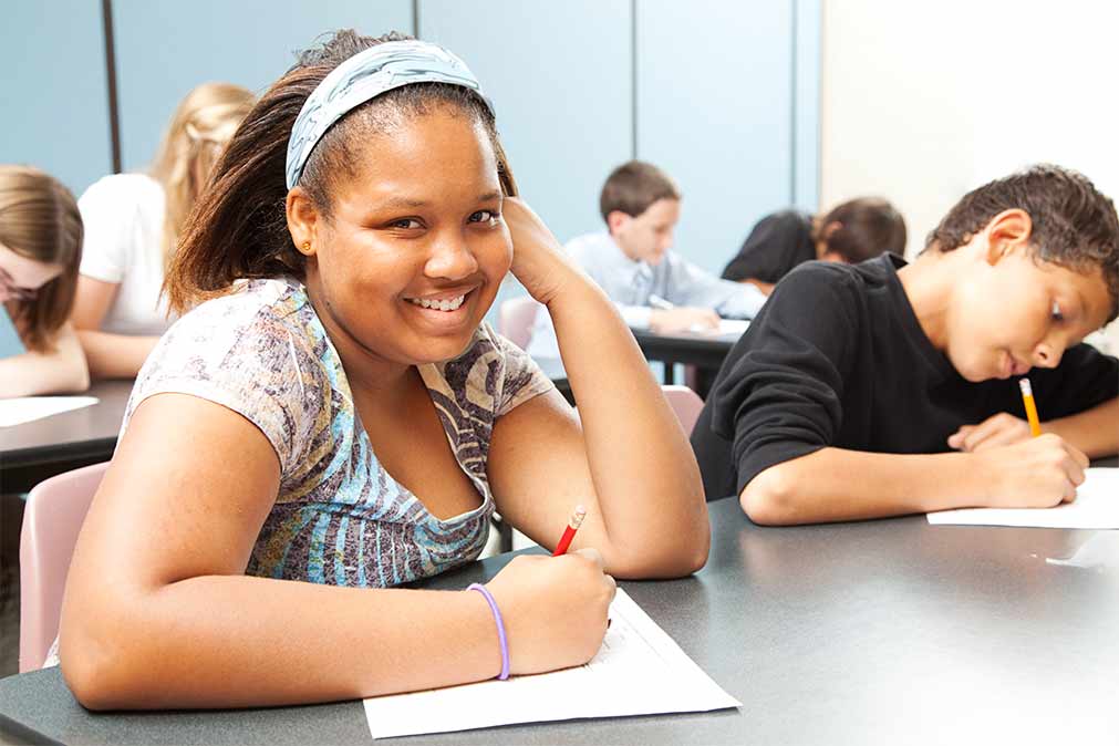 Engaged, joyous student among her peers